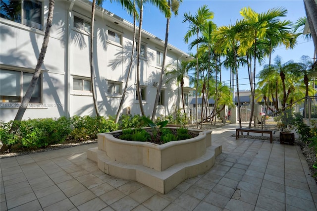 view of home's community featuring a patio area