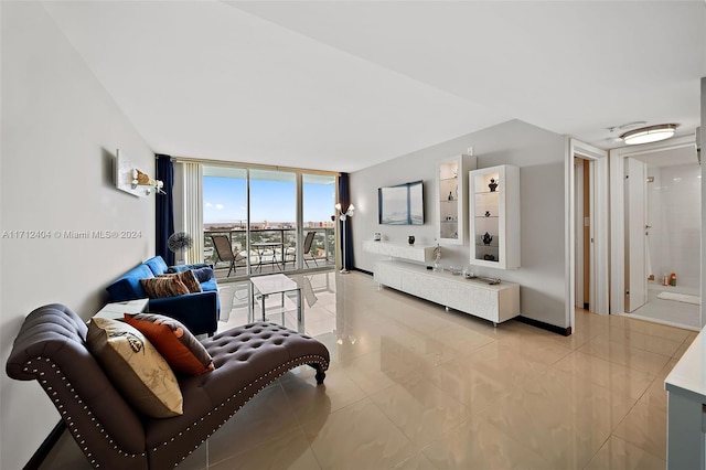 living room with floor to ceiling windows