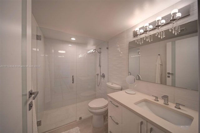 bathroom featuring toilet, a shower with door, tile walls, and tasteful backsplash