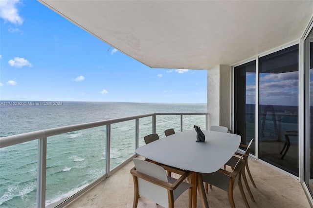 balcony featuring a water view