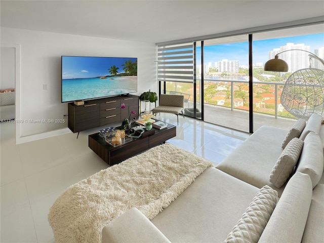 living room with light tile patterned floors, expansive windows, and baseboards