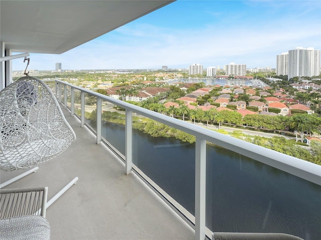 balcony with a city view and a water view