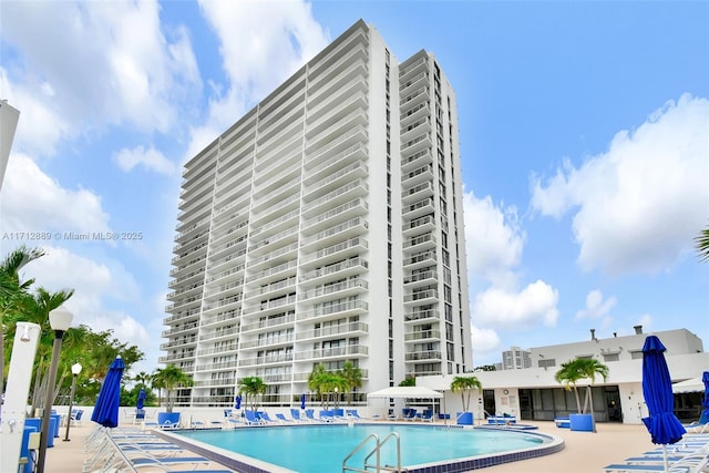 community pool featuring a patio area