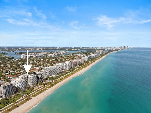 bird's eye view with a beach view and a water view