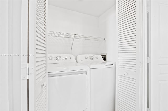 laundry area featuring washer and clothes dryer