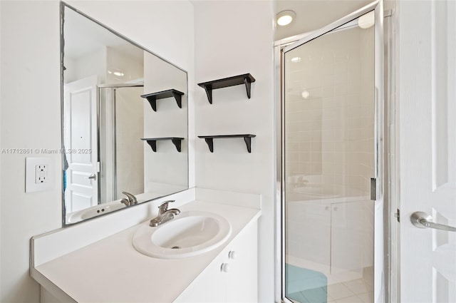 bathroom with vanity and walk in shower