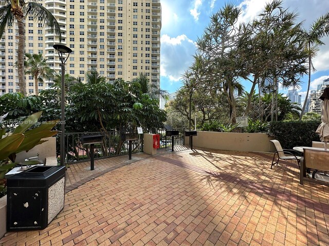 520 Brickell Key Dr Unit A1802, Miami, FL 33131 - view of patio featuring a gate
