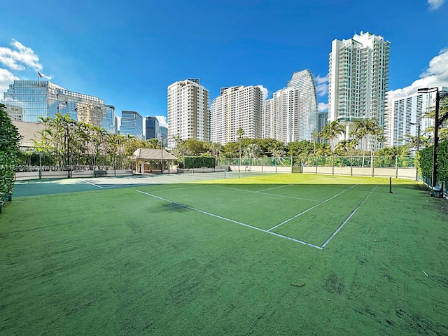 520 Brickell Key Dr Unit A1802, Miami, FL 33131 - view of tennis court featuring a view of skyline