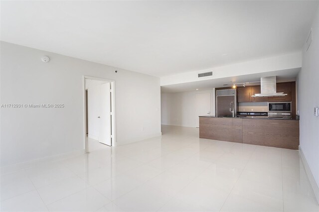 495 Brickell Ave Unit Bay407, Miami, FL 33131 - unfurnished living room featuring baseboards and light tile patterned floors