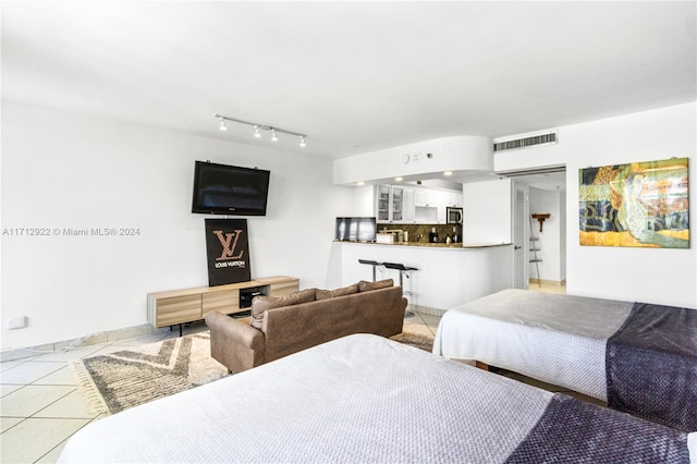 living room with light tile patterned floors