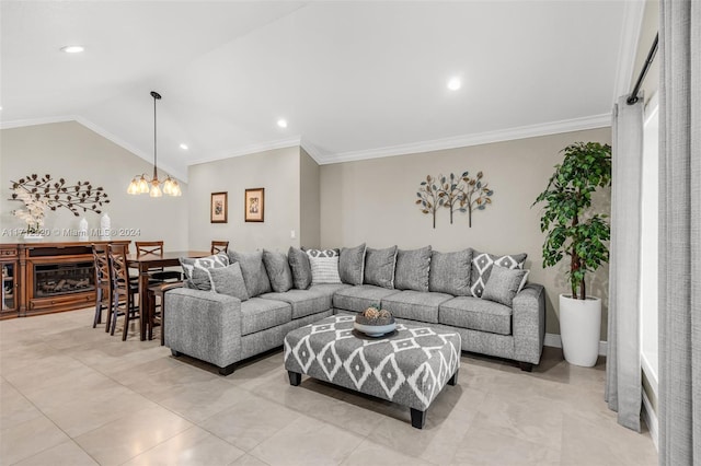 living room with an inviting chandelier, vaulted ceiling, and ornamental molding