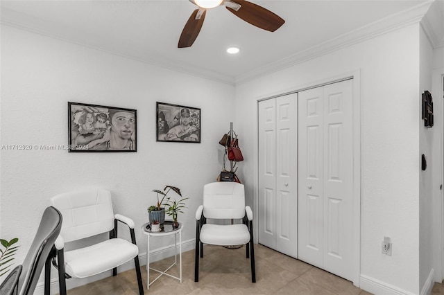 sitting room with ceiling fan, crown molding, and light tile patterned flooring