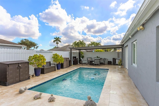 view of pool with an outdoor hangout area and a patio