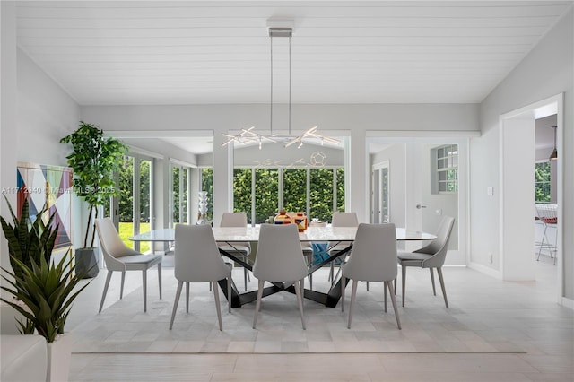 dining space with wooden ceiling and vaulted ceiling