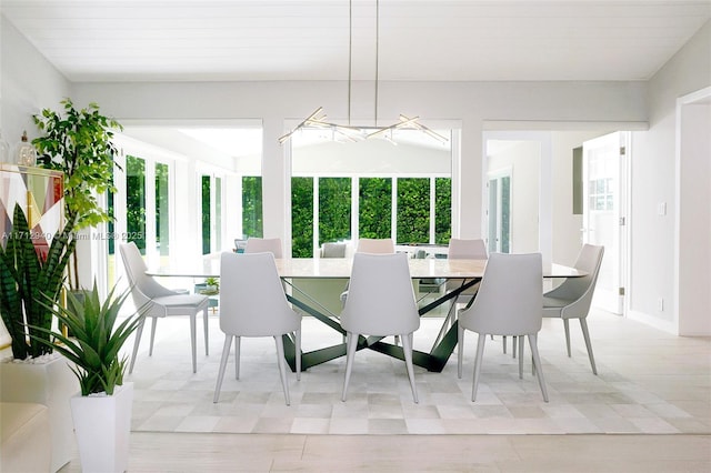 dining area featuring baseboards