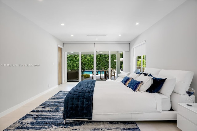 bedroom featuring access to outside and light hardwood / wood-style flooring