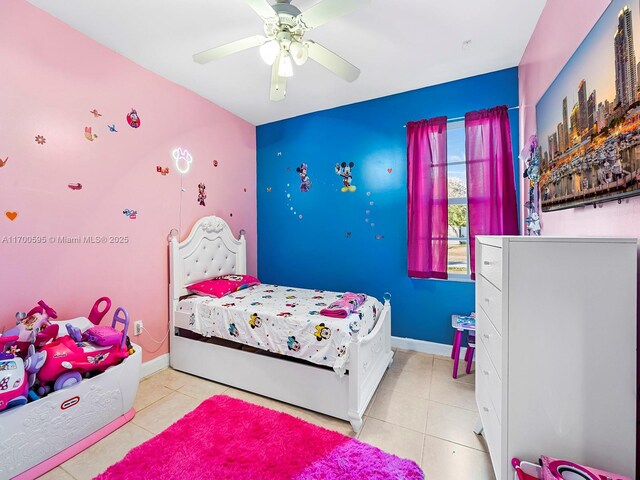 bedroom featuring ceiling fan and light tile patterned floors