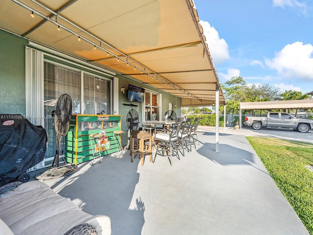 view of patio with outdoor dining space