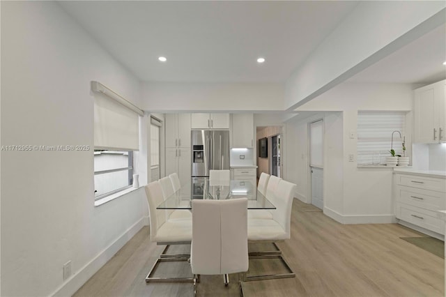 dining room featuring light wood-type flooring