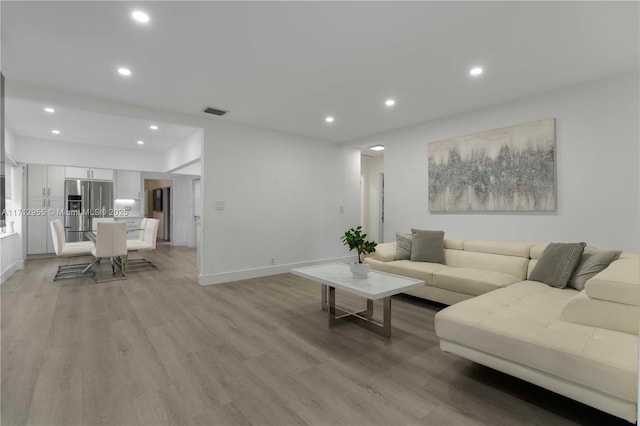 living room featuring light hardwood / wood-style flooring