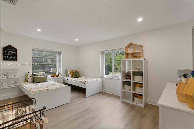 bedroom featuring light wood-type flooring