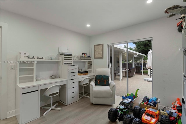 office area with light wood-type flooring