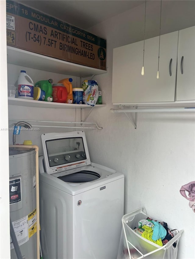 washroom featuring washer / clothes dryer and water heater