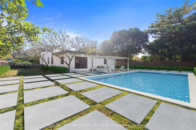 665 NE 117th St, Biscayne Park, FL 33161 - view of pool featuring a patio and a fenced backyard