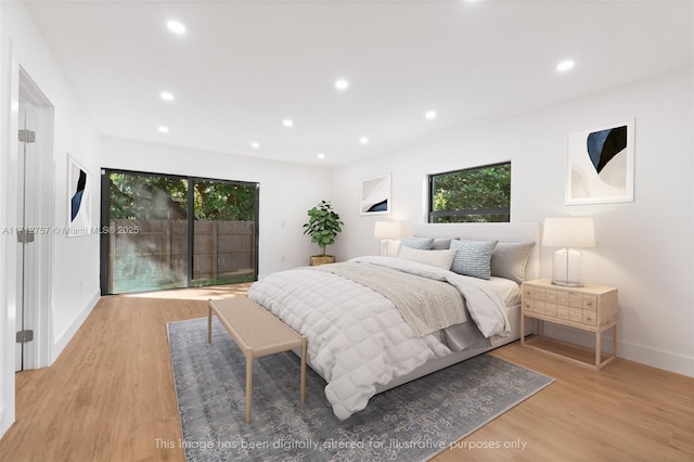 665 NE 117th St, Biscayne Park, FL 33161 - bedroom with wood finished floors, recessed lighting, and access to outside
