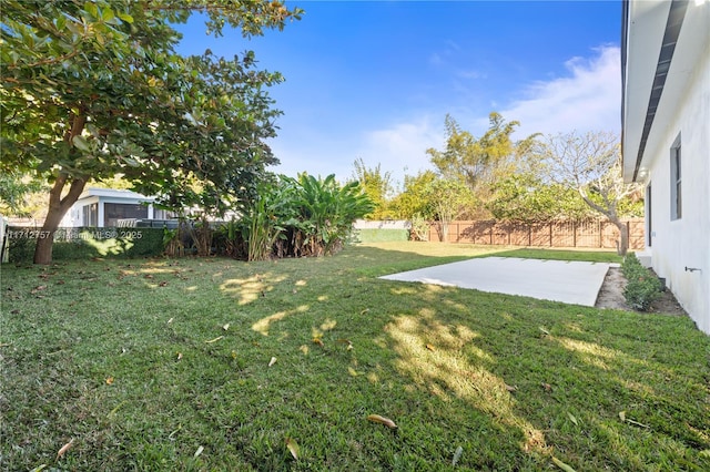 view of yard featuring a fenced backyard and a patio area