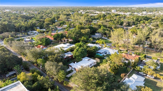 drone / aerial view featuring a forest view