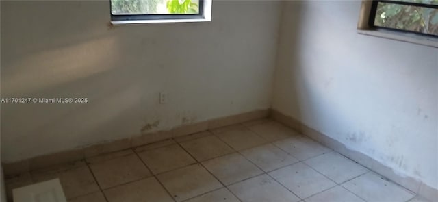 view of tiled empty room