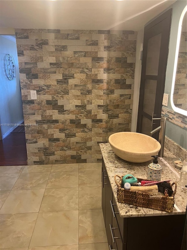 bathroom featuring vanity and tile patterned flooring