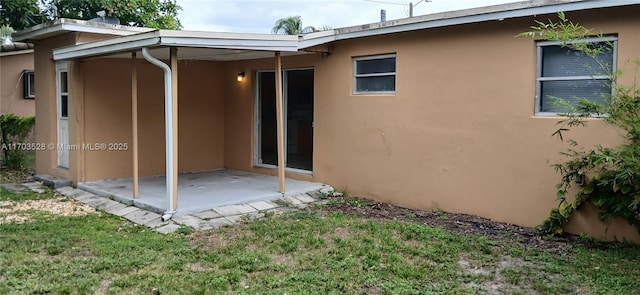 rear view of property with a patio