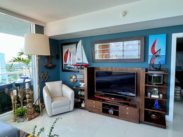 tiled living room featuring expansive windows