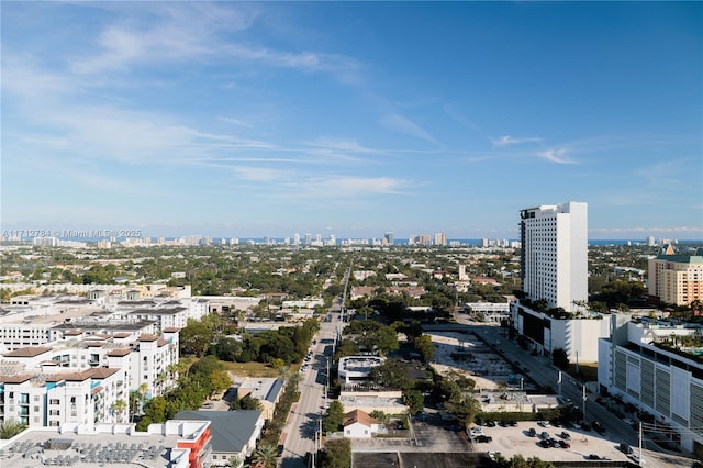 drone / aerial view featuring a city view