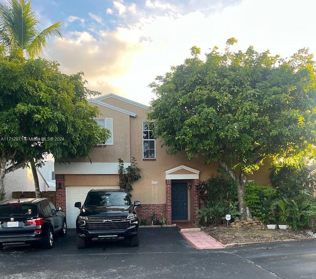 view of front of home with a garage