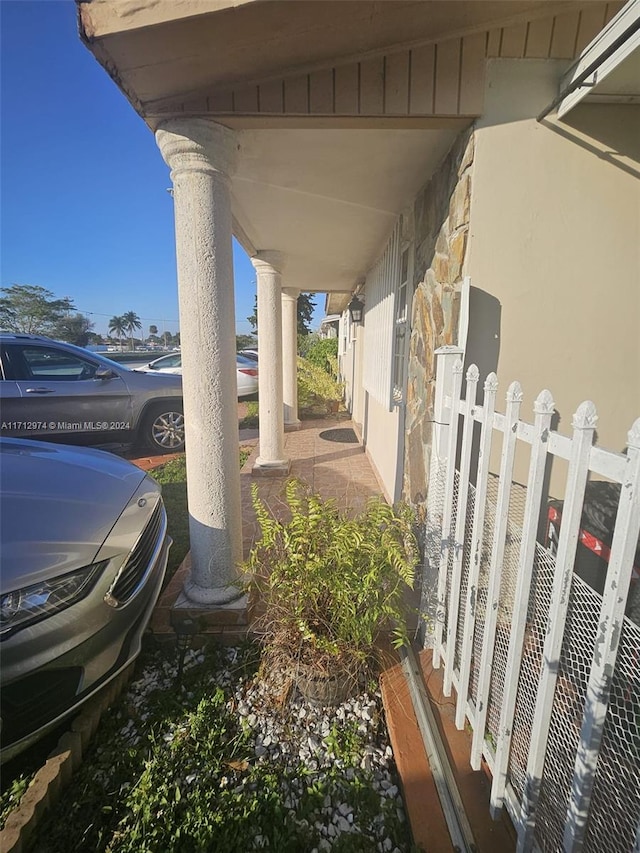 exterior space featuring ornate columns