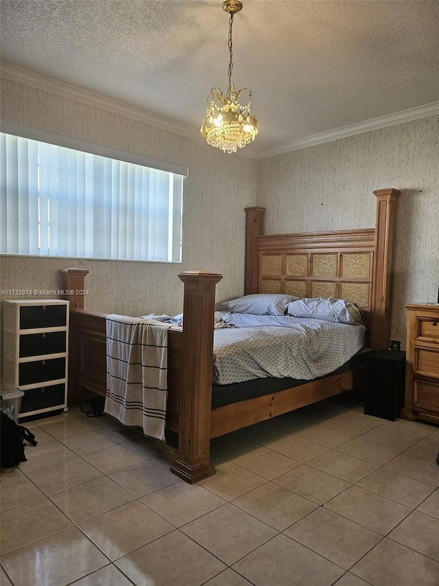 bedroom featuring a chandelier, a textured ceiling, crown molding, and tile patterned flooring