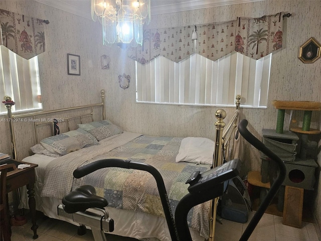 tiled bedroom with a notable chandelier and ornamental molding