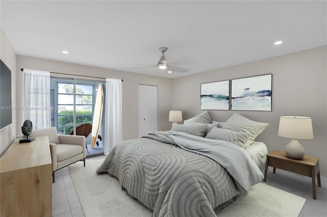 tiled bedroom with access to outside and ceiling fan