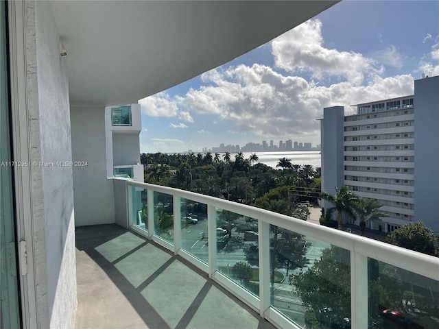 balcony featuring a water view