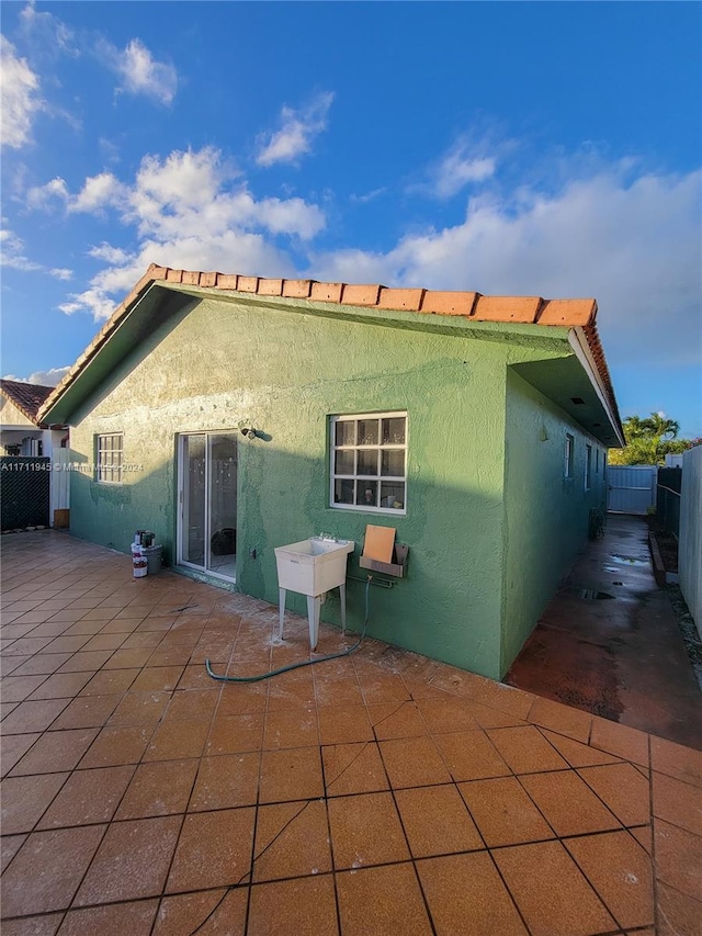 rear view of house with a patio area