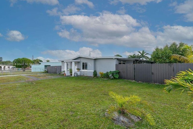 exterior space with a front lawn