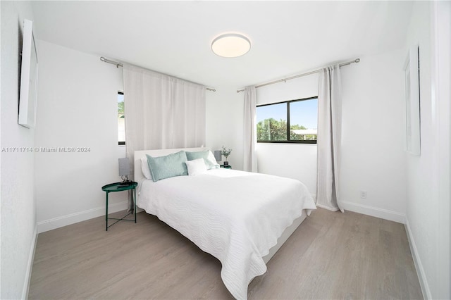 bedroom featuring light hardwood / wood-style flooring