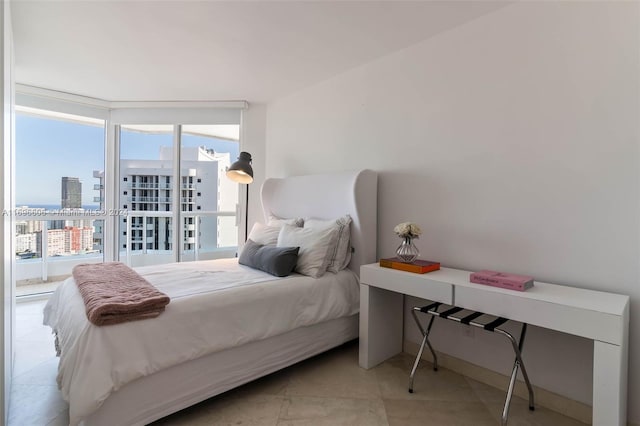 bedroom featuring light tile patterned floors