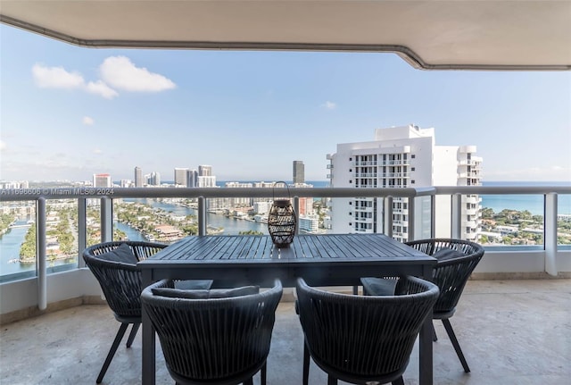 balcony featuring a water view