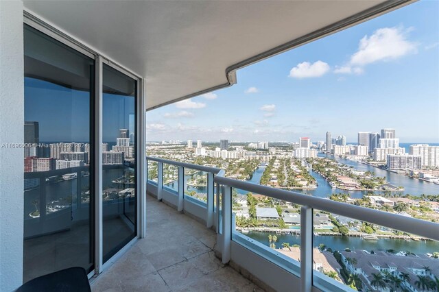 balcony featuring a water view