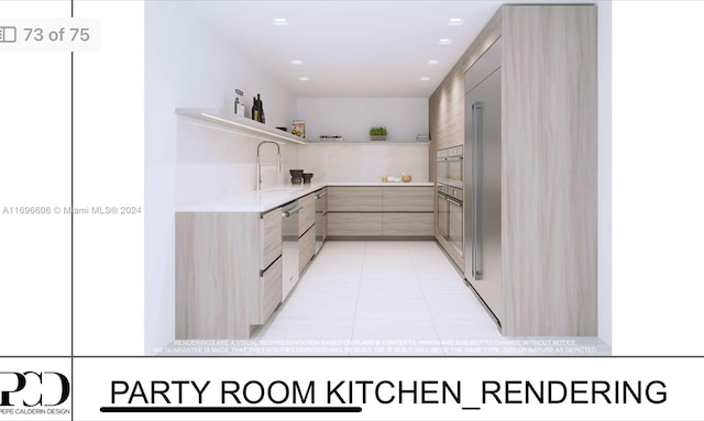 kitchen with light tile patterned flooring, sink, light brown cabinetry, and white oven