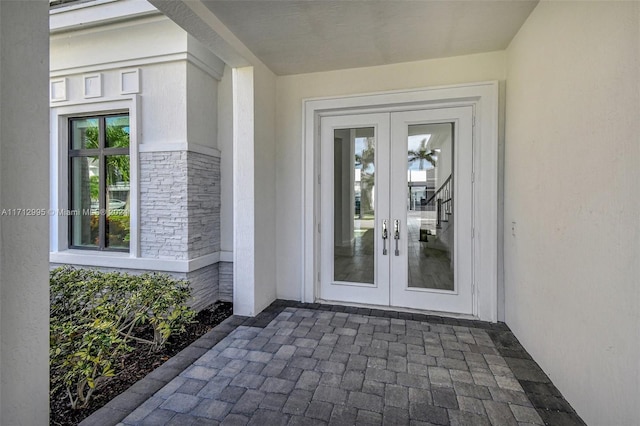 doorway to property with french doors